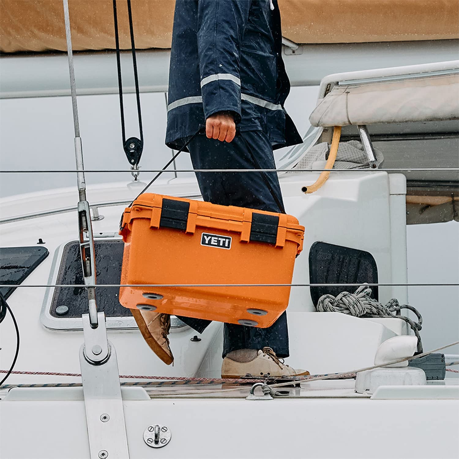 Fisherman with YETI Cargo Box on boat