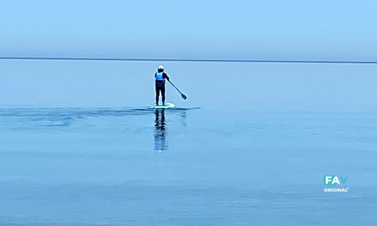 60 year old paddling on Adventure All Rounder SUP Board on Lake Huron