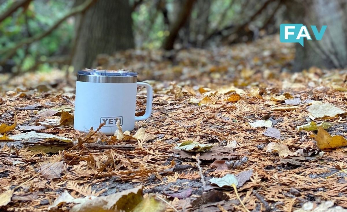White YETI Mug on fall trail during a fall hike