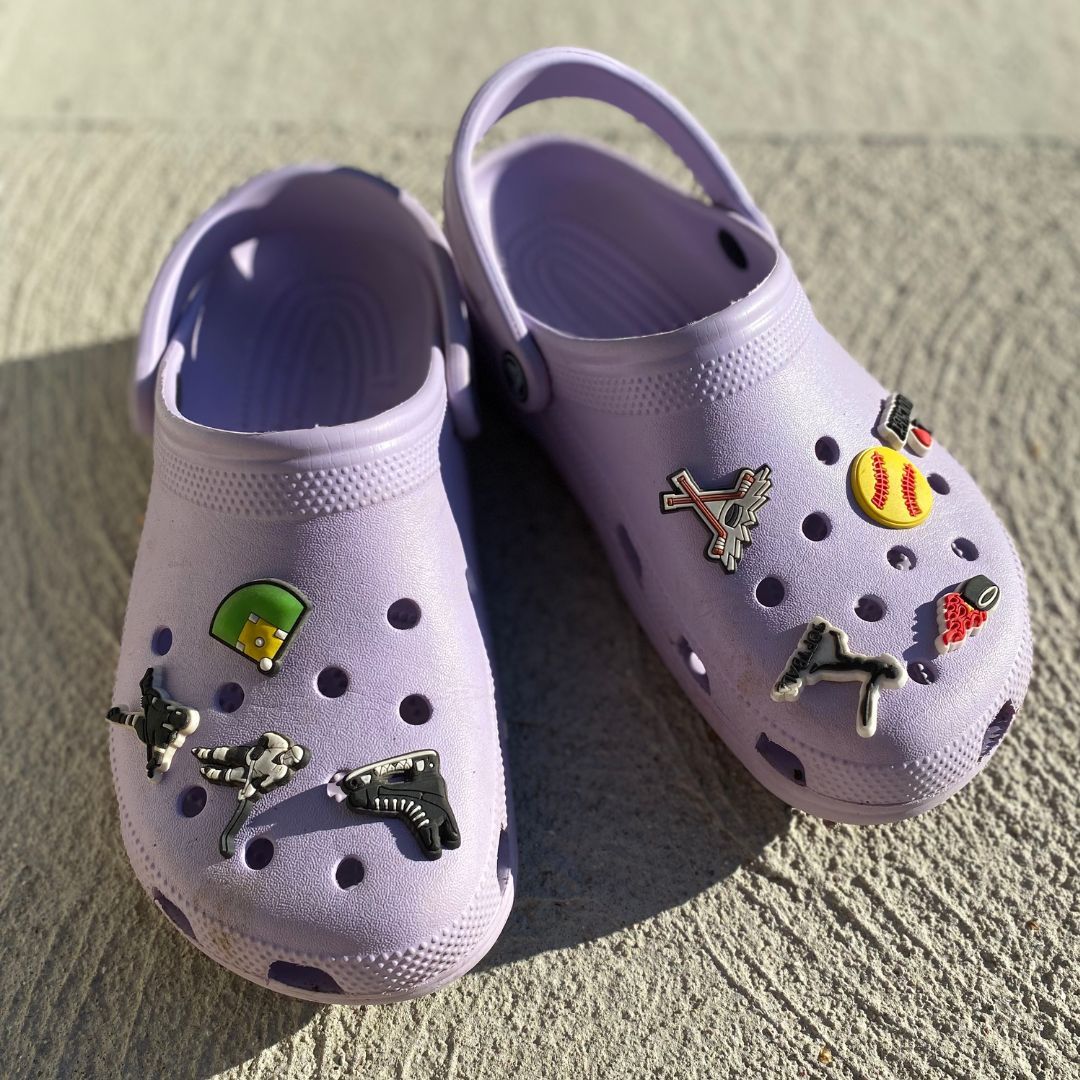 Purple Crocs with a lightweight design and water-resistant materials
