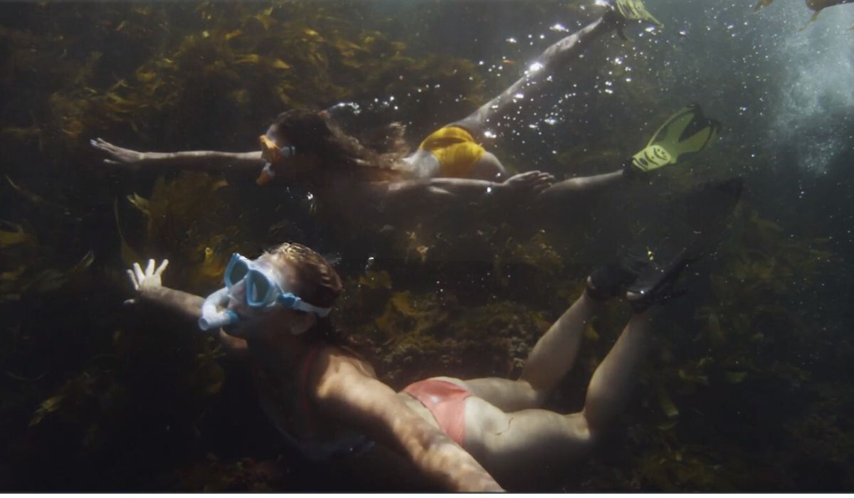 Two women snorkeling with Speedo Adult Adventure Swim Masks and Snorkel Set