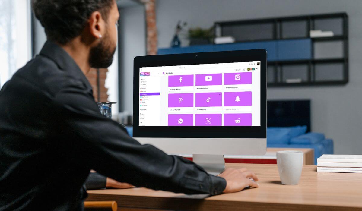 Gentleman on laptop looking Inside the AMBSDR platform where the AI Assistants live