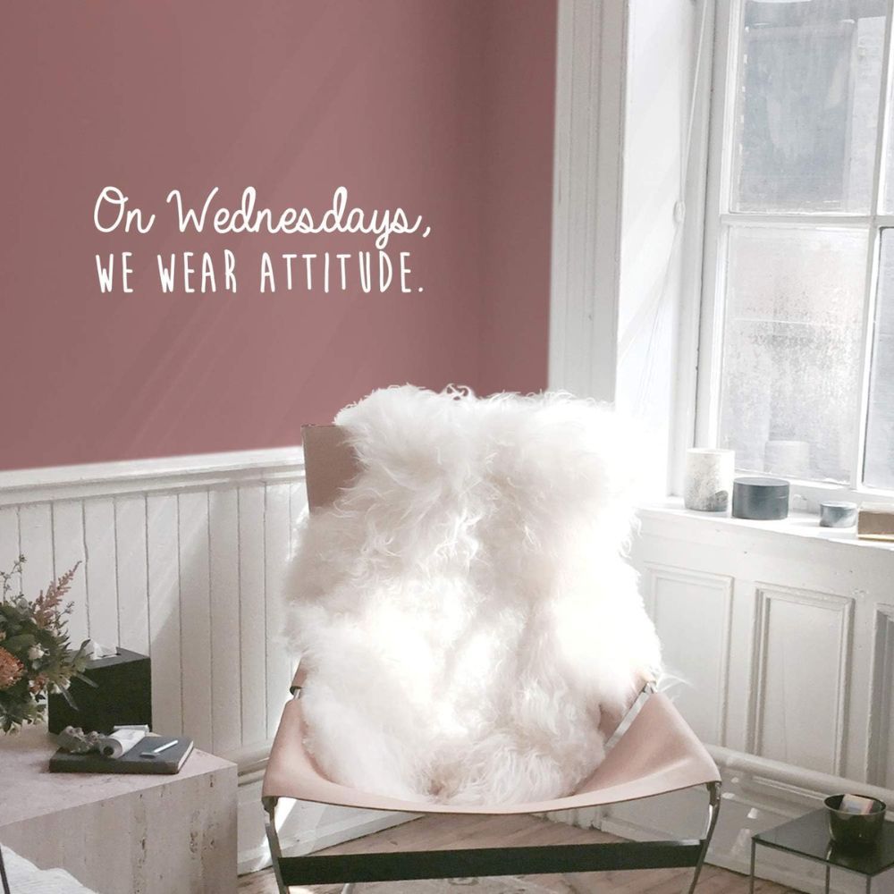 White wall decal "On Wednesday's, We Wear Attitude." Available on Amazon